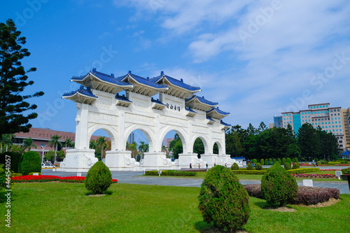 The main gate of National Taiwan Democracy Square of Chiang Kai-Shek Memorial Hall on a sunny day. The meaning of the chinese text on the gate is “liberty square” photo