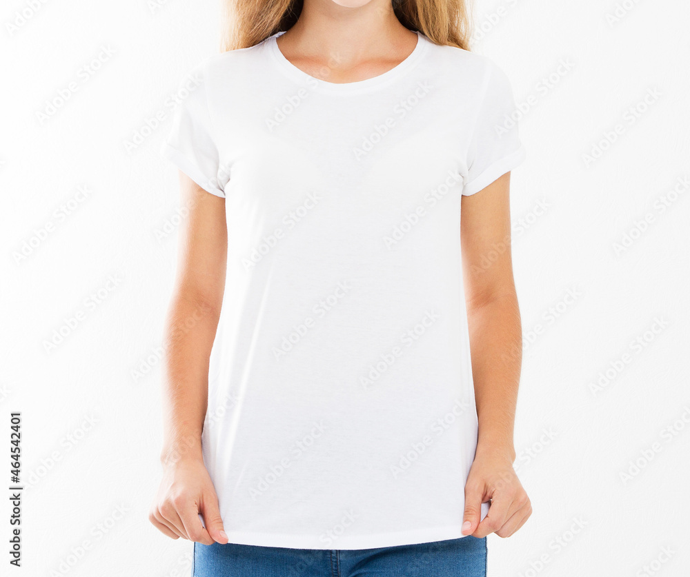 Young beautiful girl posing with blank white tshirts. Ready for your design Young beautiful girl posing with blank white tshirts. Ready for your design