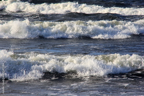 Seascape during a storm with big waves, close-up, Carnikava, Latvia. Big and powerful sea waves during the storm 