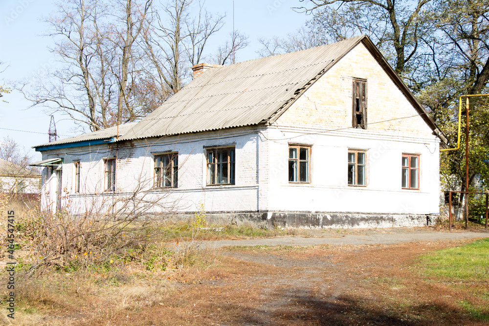 Old and new buildings of a medical institution in the countryside of Ukraine
