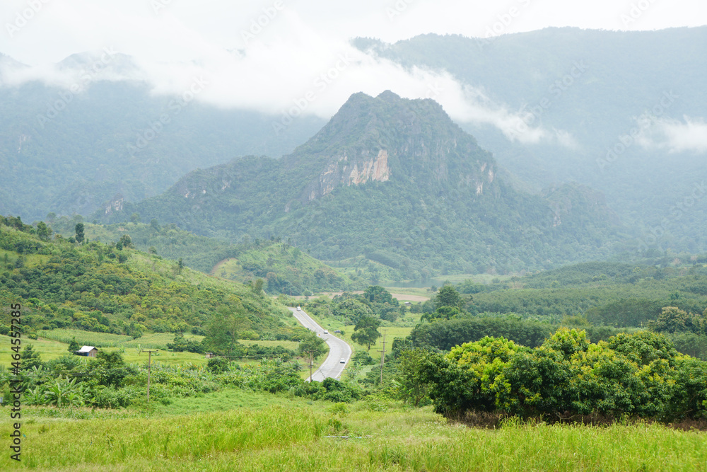 Beautiful natural scenery of limestone mountains and roads of Tham Sakoen National Park, Nan province, Thailand.