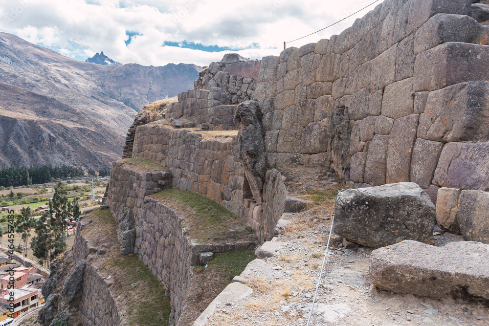 inca ruins in the sacred valley carved in granite windows bumps and stone walls located in ollantaytambo cusco peru on a sunny day with blue sky
