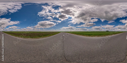 seamless hdri 360 panorama view on asphalt road among fields in summer evening with awesome clouds in blue sky in equirectangular spherical projection, ready AR VR virtual reality content