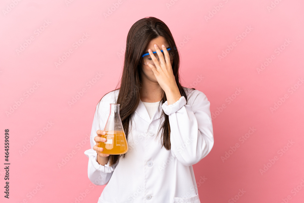 Young scientific girl over isolated pink background with tired and sick expression Young scientific girl over isolated pink background with tired and sick expression