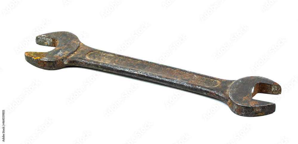 An old wrench on a white background An old wrench on a white background