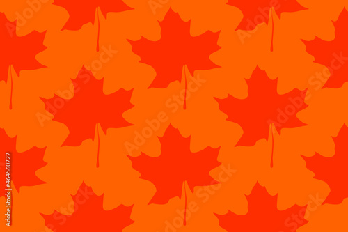 Seamless vector drawing of maple leaves in autumn colors