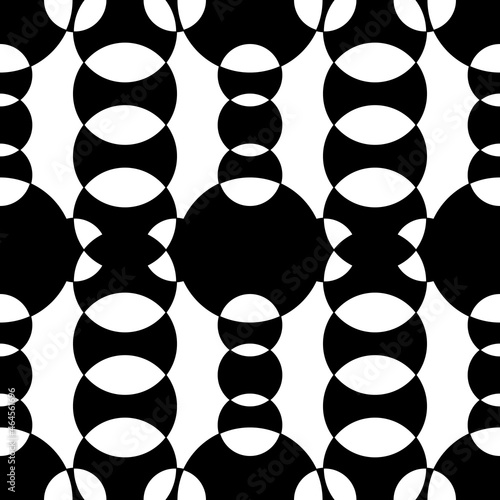Abstract black and white circles merging into one another. Vector.