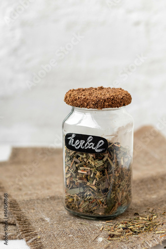 herbal tea in a glass jar on table