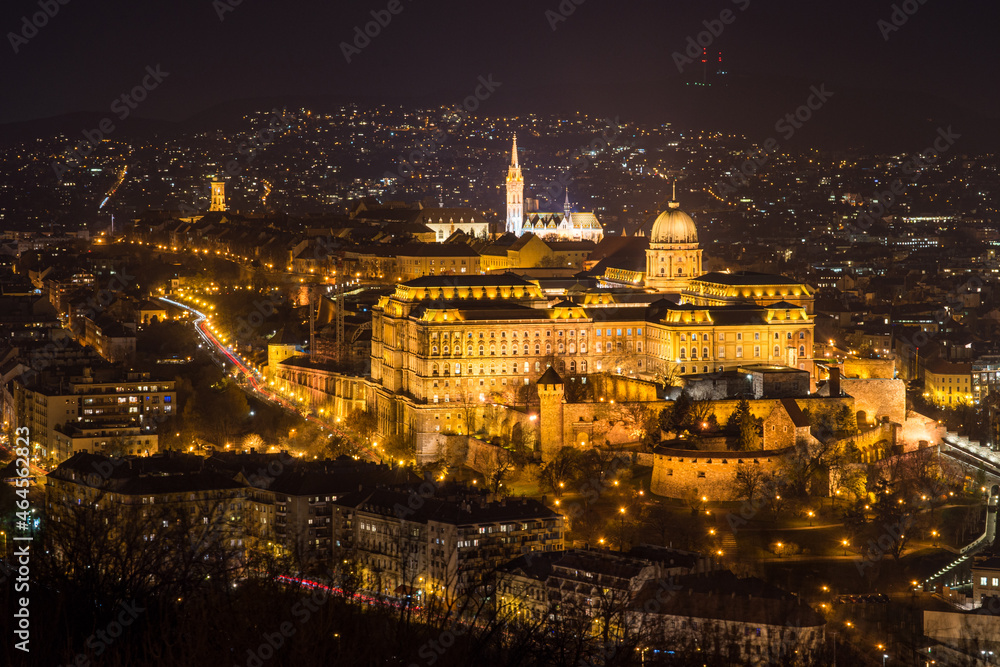 Historic Royal Palace - Buda Castle or Budai Vár close up evening view with lights on from Buda Hills, Citadella in Budapest, Hungary