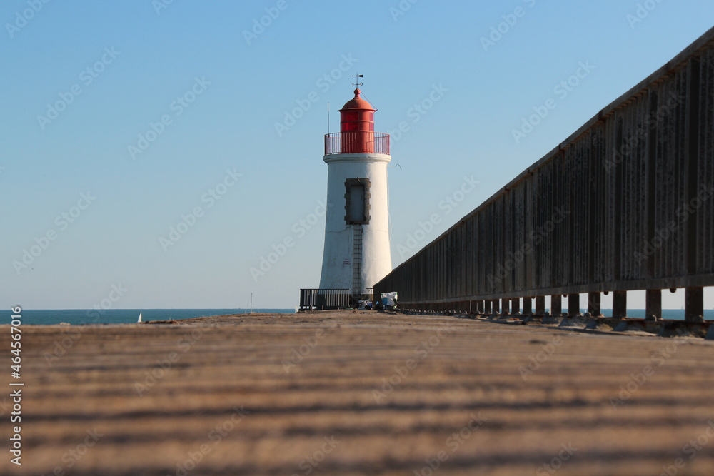 pier and lighthouse in la chaume in vendée in france