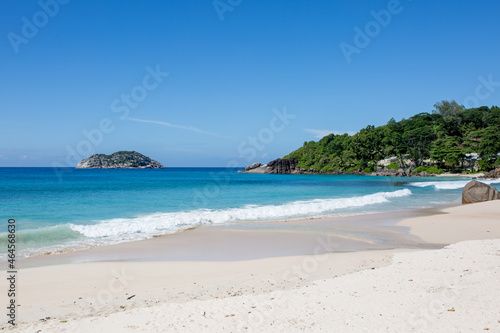 Beautiful nature of the sea tropical landscape. Exotic tropical nature of the Seychelles, a white beach surrounded by palm trees and granite rocks.