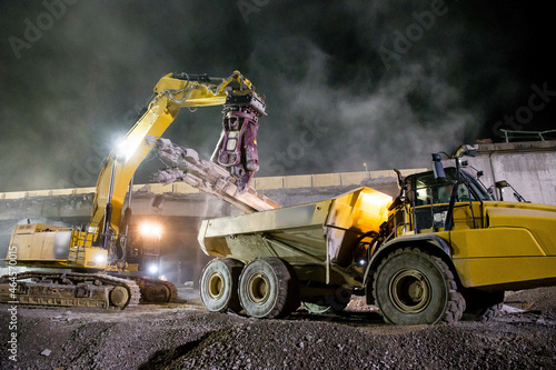 A fleet of Caterpillar machines demolished two Autobahn bridges at an Autobahn Cross. photo