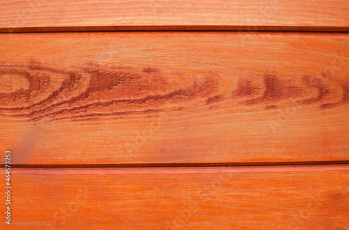 Natural orange or mahogany wood texture. Natural ornament. Horizontal wooden planks. Wood background.