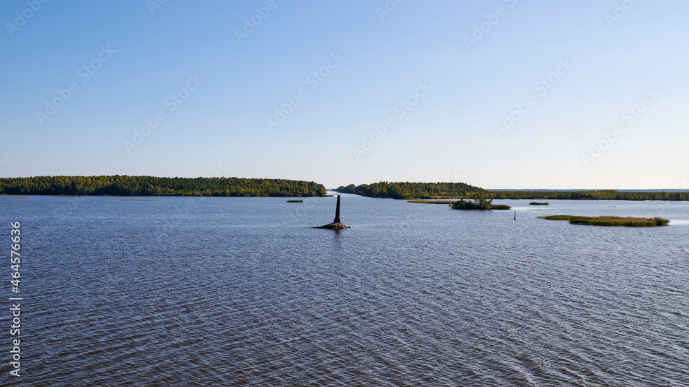 Russia. River Kovzha. Obelisk at the entrance to the Belozersky bypass channel