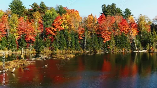 Drone footage of Lac-des-arpents-verts in the Laurentians with the colors of fall photo