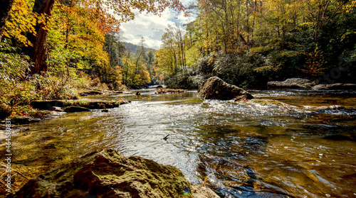 A beautiful mountain river in Western North Carolina, USA, in the fall with the fall colors. photo