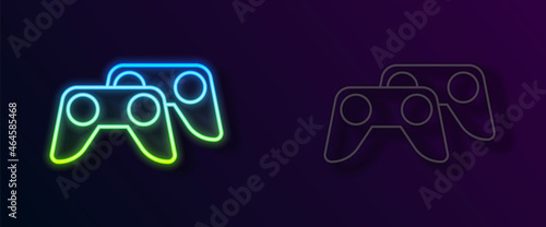 Glowing neon line Game controller or joystick for game console icon isolated on black background. Vector