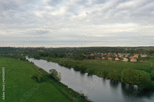 river and green meadows