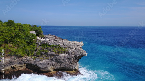 cliffs and the ocean nature sky blue summer sunny exotic explore adventure jump Bali Indonesia Nusa Penida drone view landscape 