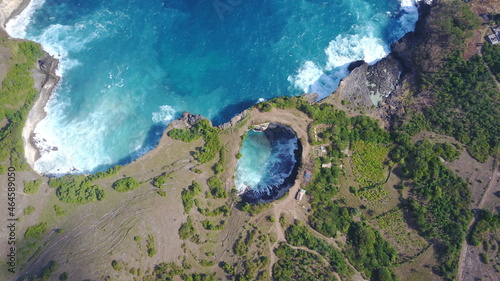 drone view of the sea hole nature beach break waves blue broken beach Bali Indonesia island Nusa Penida travel adventure explore