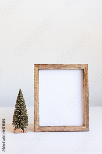 Christmas background empty wooden picture frame mock up and decoration. Winter holidays celebration concept with copy space for text. Mockup
