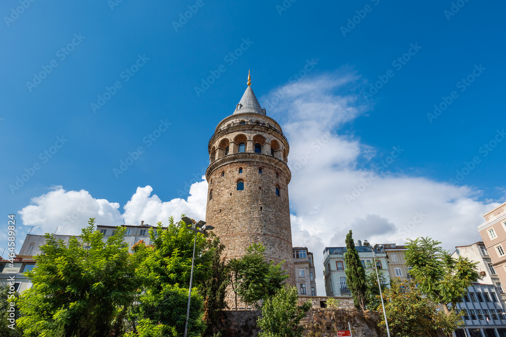 Galata Tower in Istanbul in summer, symbolic landmark in Galata area of Istanbul, Turkey. The historical building is famous for tourists