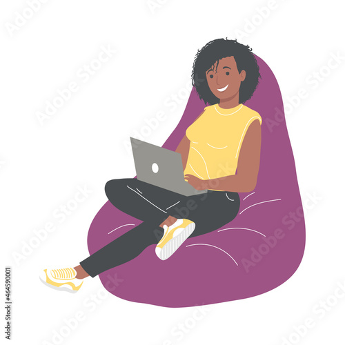 afro woman using laptop