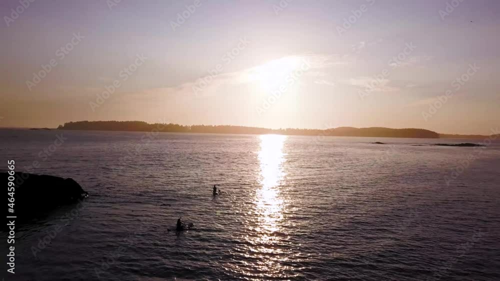 Kayaking During Sunset On The West Coast Of Canada Kayaking During Sunset On The West Coast Of Canada