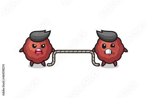 cute meatball character is playing tug of war game