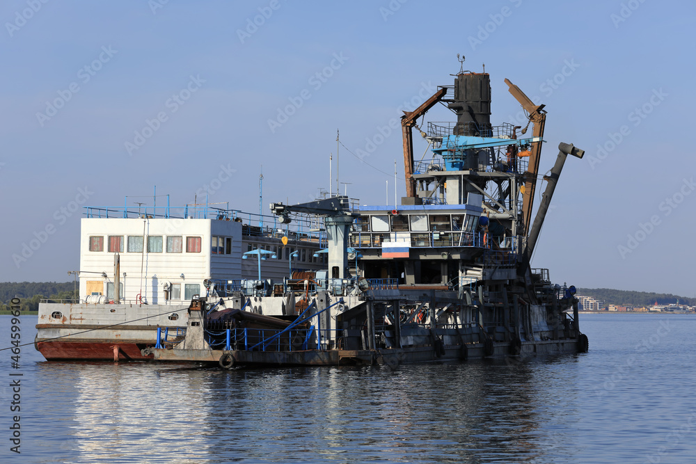 Dredger ship dredging sand and gravels from the Volga river near city of Kazan, republic Tatarstan, Russia.