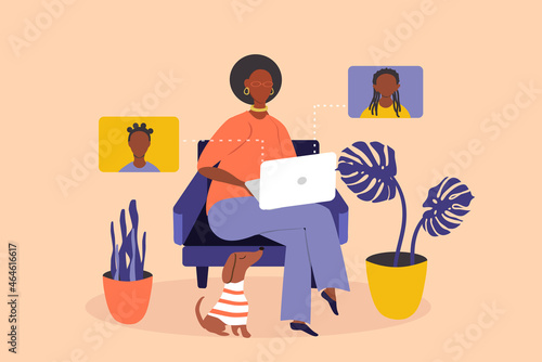 vector flat style illustration on the theme online communication. a black woman sitting in an armchair with a laptop and communicating via the web with her daughters or granddaughters.