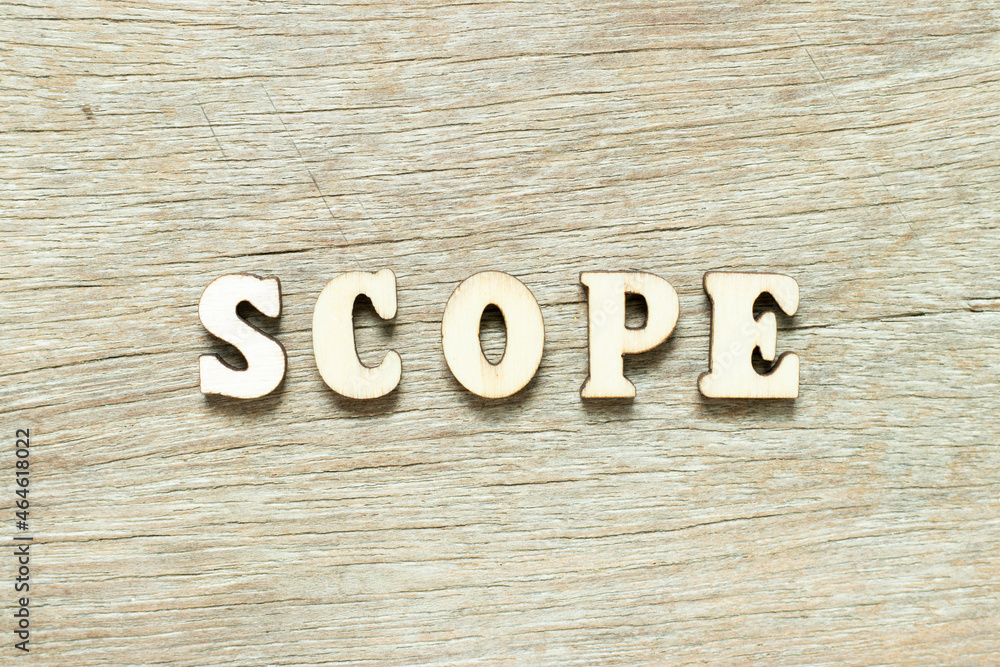 Alphabet letter in word scope on wood background Alphabet letter in word scope on wood background