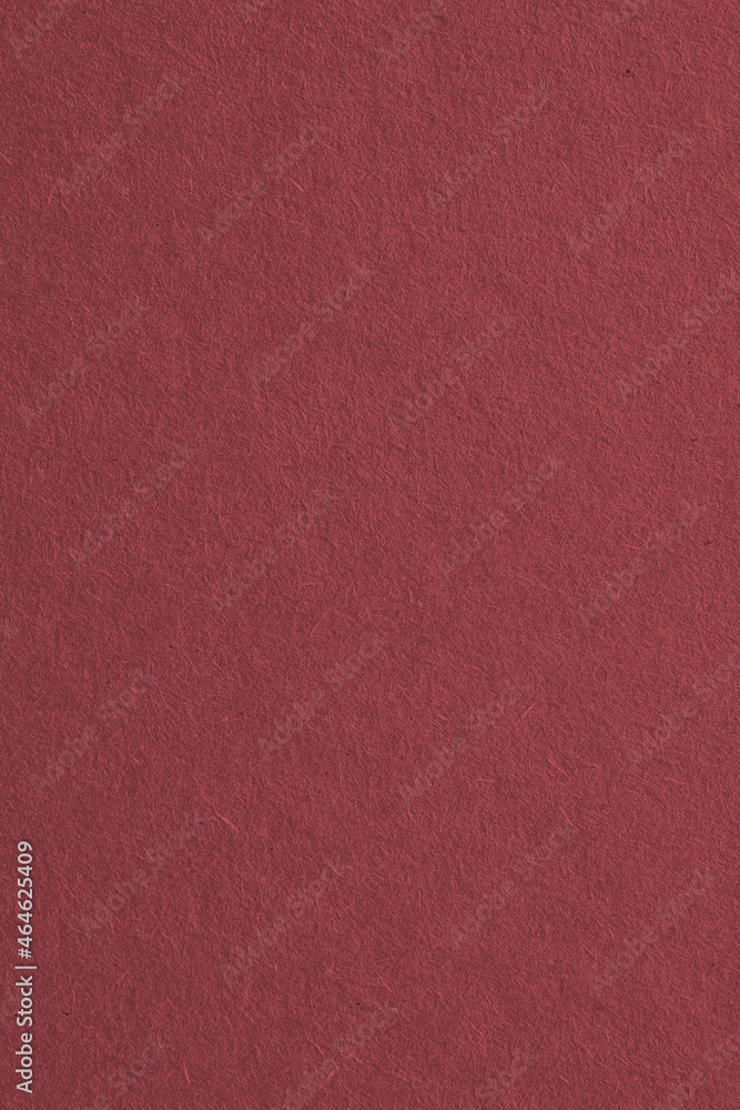 Fototapeta premium The surface of brown cardboard. Paper texture with cellulose fibers. Dark vertical paperboard background. Textured graceful and the home backdrop. Macro
