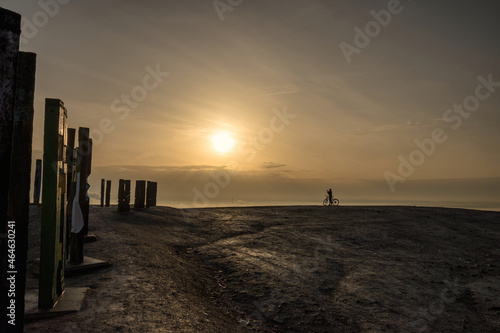 sunrise over industrial landscape