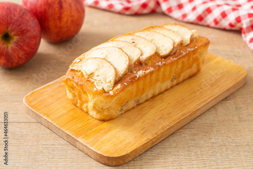 apple loaf crumbled on wood board