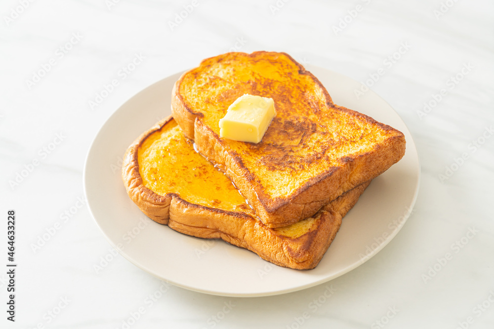French toasted with butter and honey French toasted with butter and honey