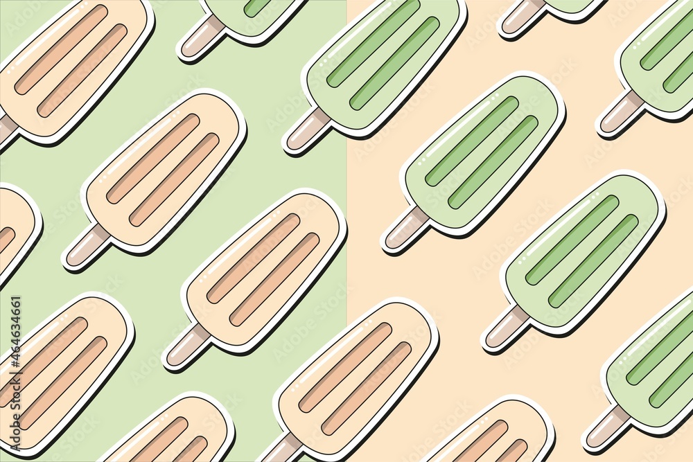 Ice cream sticks on pastel yellow and green background Ice cream sticks on pastel yellow and green background