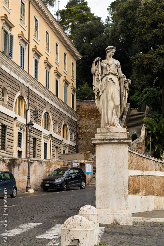 Old statue in Piazza del Popolo (People's Square), Rome, Italy 