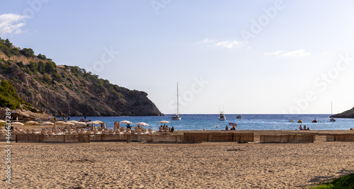 Cala Llonga with turquoise water, Ibiza island, Balearic Islands, Spain, popular with tourists photo