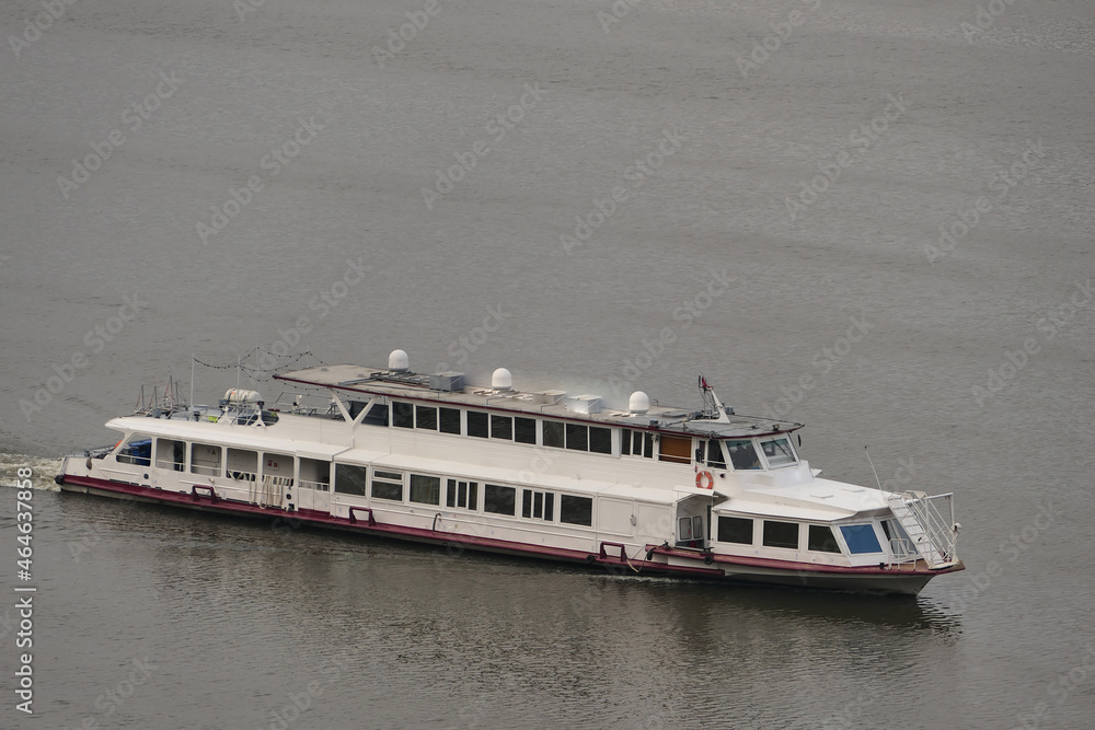 Obraz premium Passenger tourist ship. Traveling by water transport.