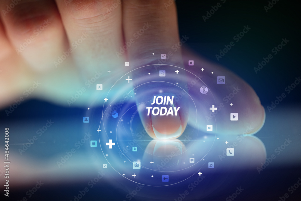 Finger touching tablet with social media icons concept Finger touching tablet with social media icons concept