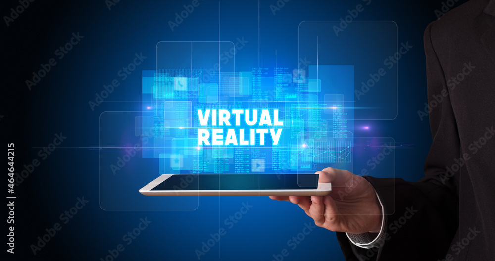 Person holding tablet, technology concept Person holding tablet, technology concept