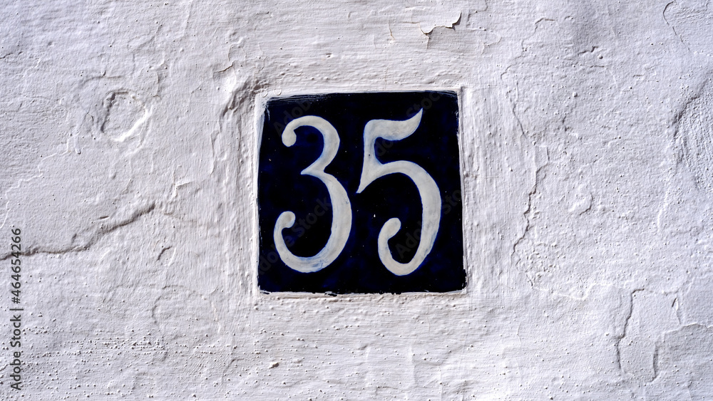 ceramic house number table. number: 35. on a white background ceramic house number table. number: 35. on a white background