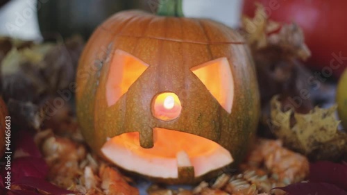 jack o lantern with pumpkins blurred focus