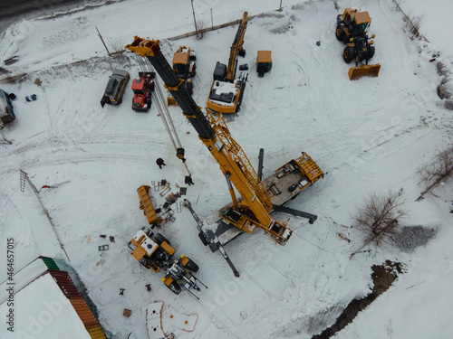 Wallpaper Mural Mobile construction crane with yellow telescopic boom. installation of the bootloader. flying drone Torontodigital.ca