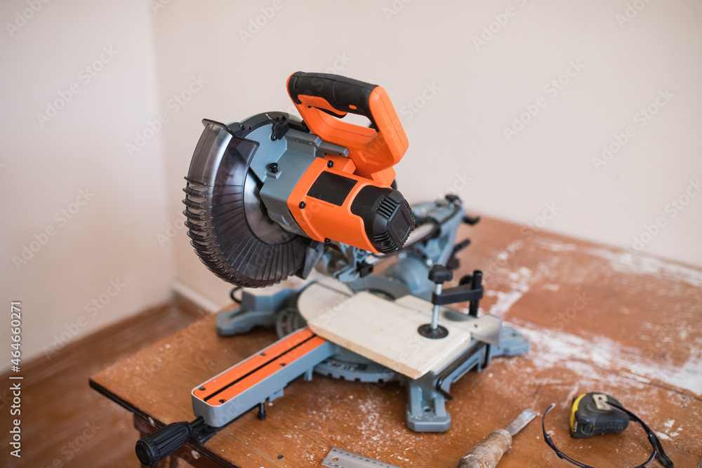 Equipment in a carpentry workshop. carpentry sawing with a circular saw for wood. workshop at home. Craft. Wood processing process. Installation for sawing boards. Equipment in a carpentry workshop. carpentry sawing with a circular saw for wood. workshop at home. Craft. Wood processing process. Installation for sawing boards.
