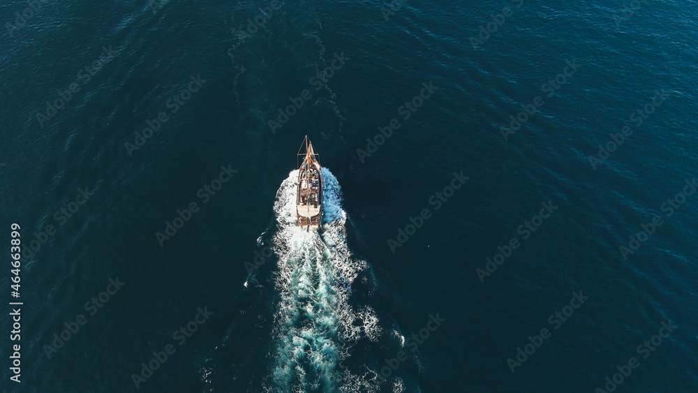 Sail boat in the sea, aerial view, drone shot.