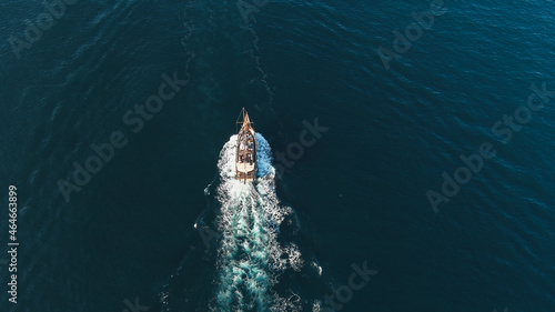 Sail boat in the sea, aerial view, drone shot.