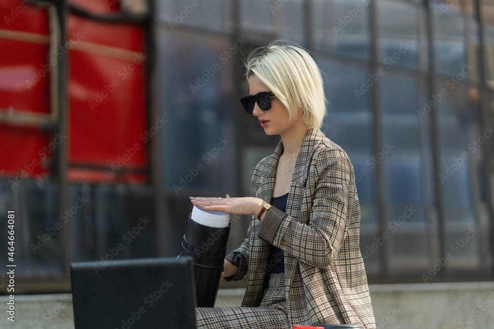 Fototapeta premium She is putting the plans back