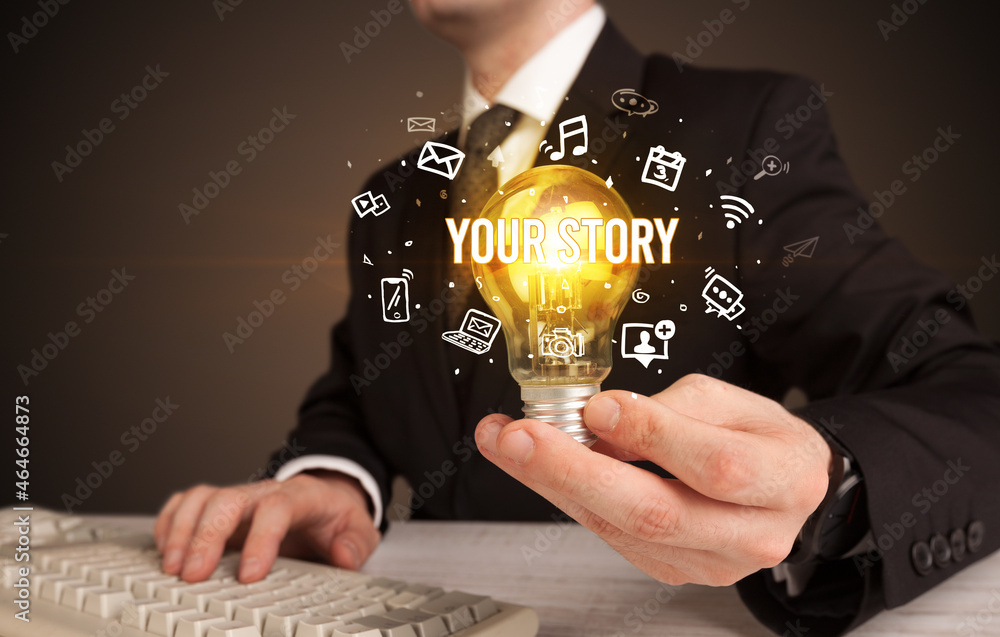 Businessman holding a light bulb, social media concept Businessman holding a light bulb, social media concept